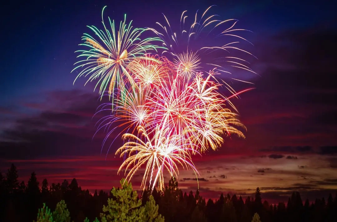 A photo shows fireworks exploding in the sky.