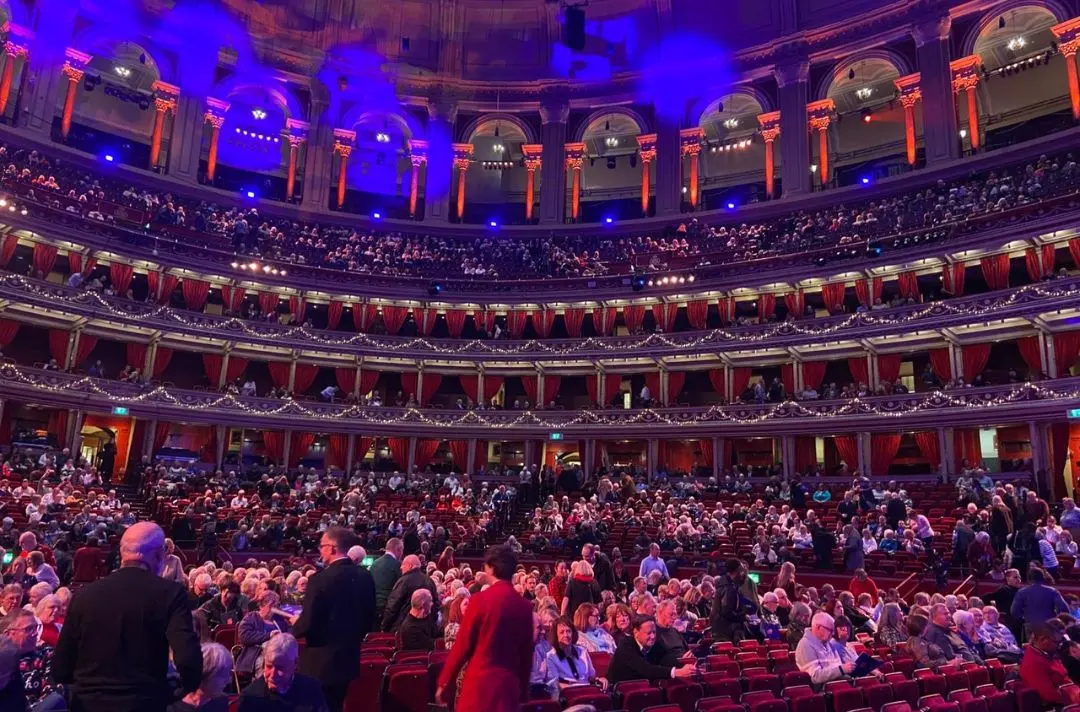 The audience takes their teaks in the Royal Albert Hall
