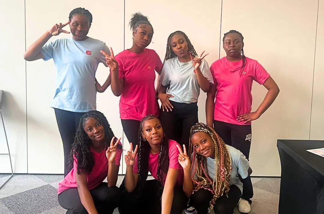 A photo shows the members of Clapton Dance Group.