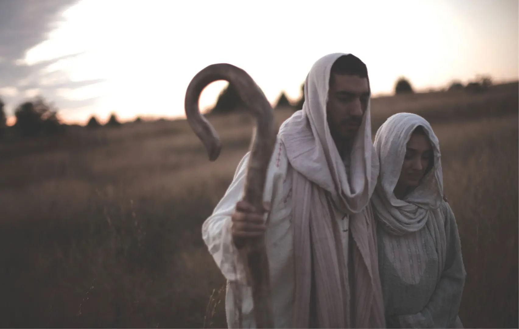 Mary and Joseph travelling through the wilderness.