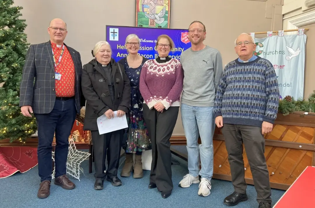 A photo shows an ecumenical event at Kendal.