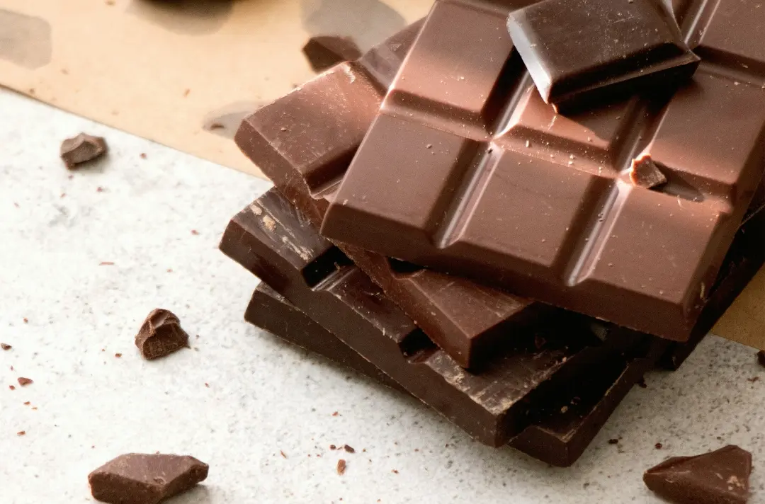 An image of multiple chocolate bars stacked on top of each other