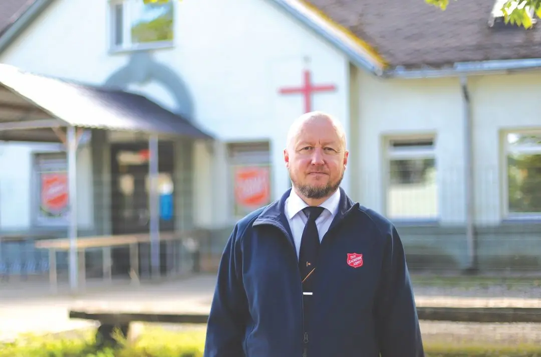 Corps leader Renno Rannamae standing in front of Tallinn Corps.
