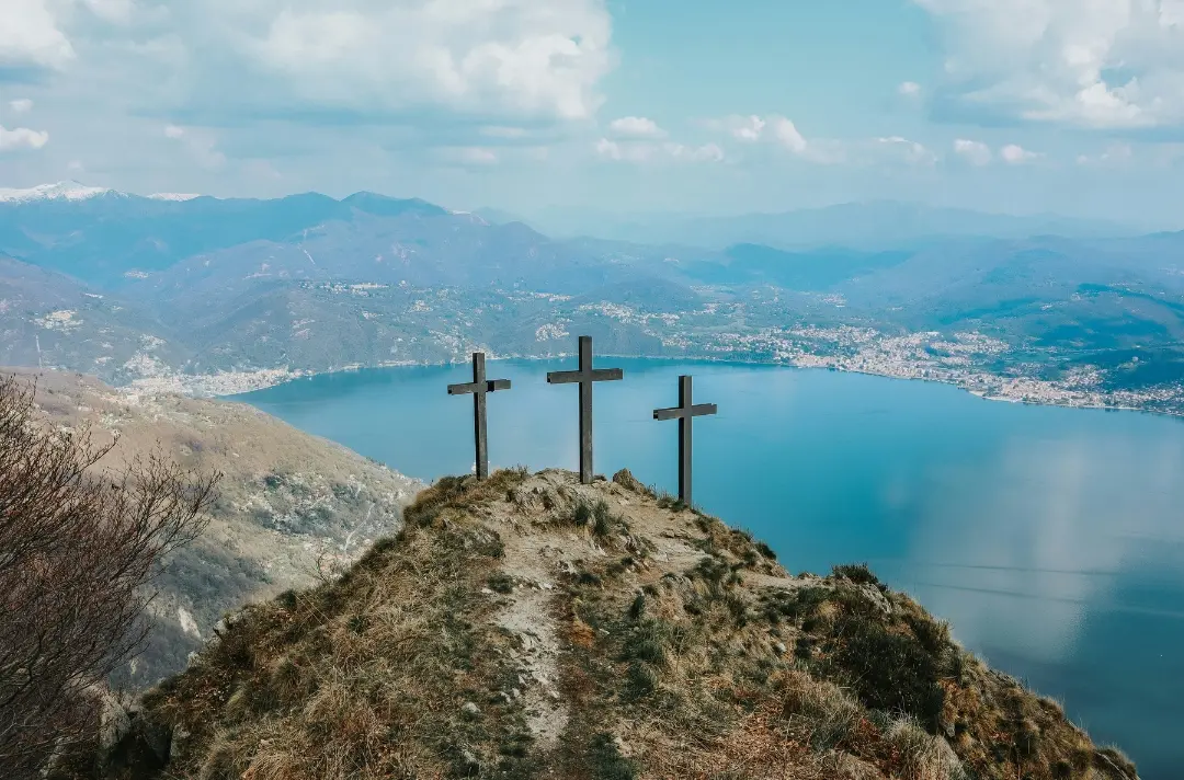 An image of three crosses on a hill