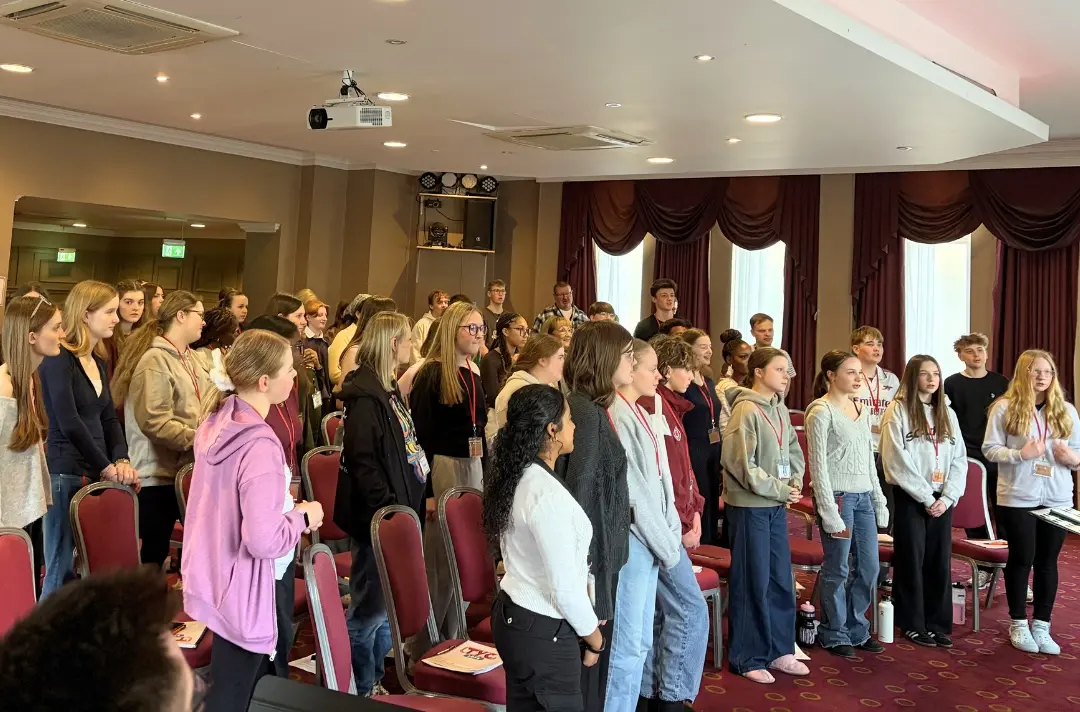 A photo shows a rehearsal at Territorial Youth Choir.