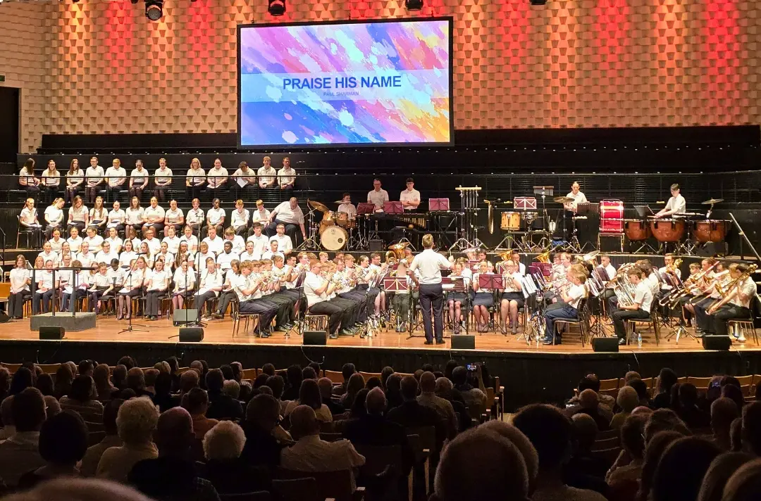 A photo shows Territorial Youth Band and Choir at Lighthouse Arts Centre.