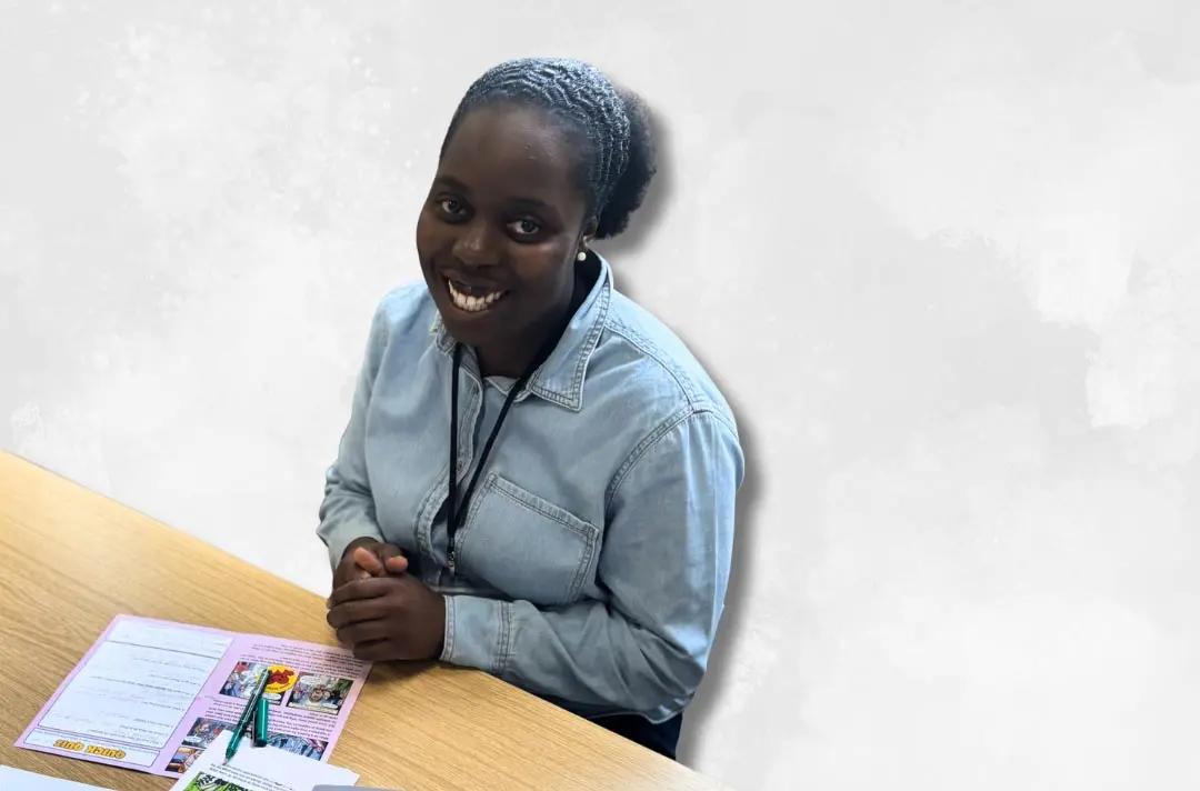 A photo shows Ibukun Baku at her desk.