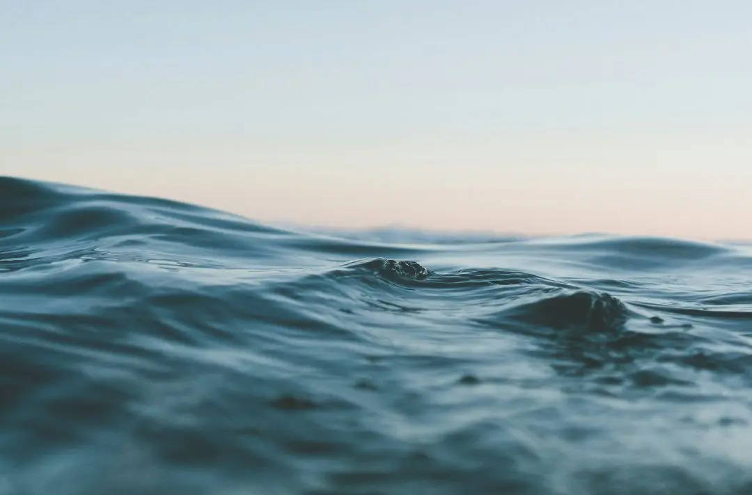 A body of water on calm sea.
