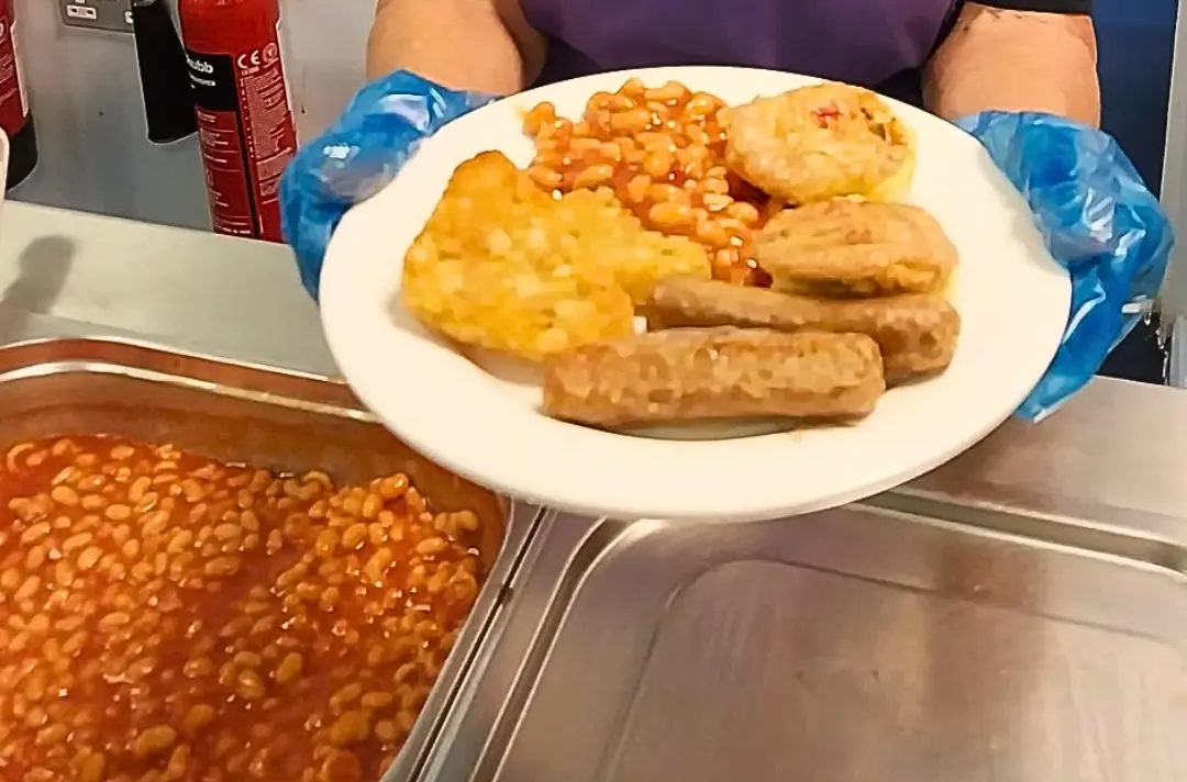 A photo shows a large plate of hot vegan breakfast at Ilford.