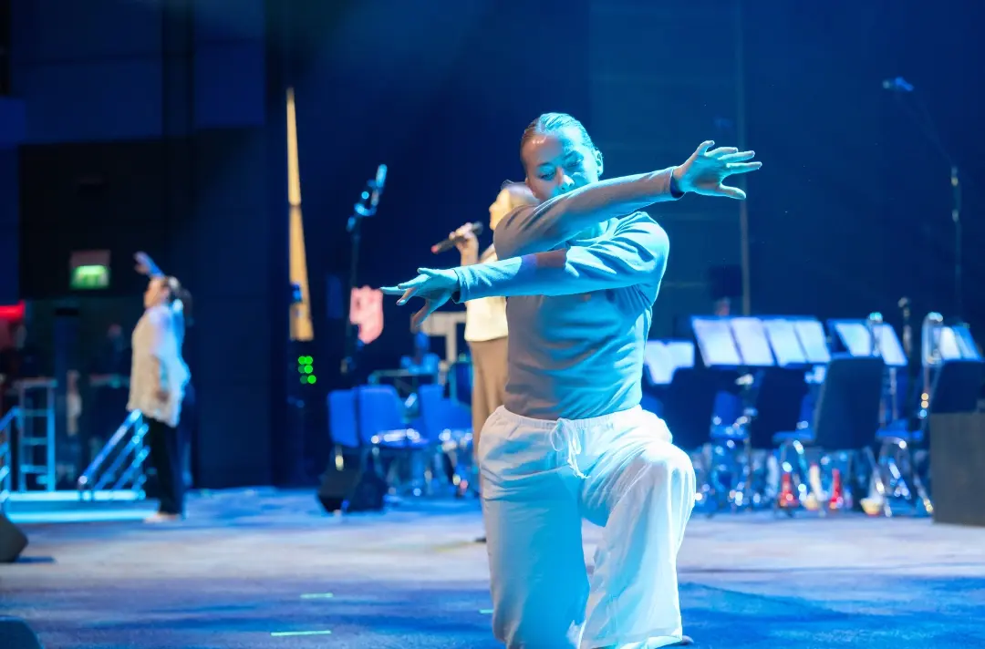 A photo shows a MACA Dance performance from Together 26.