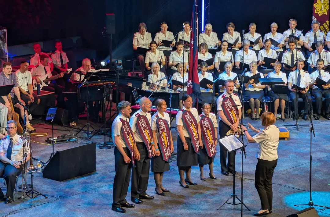 The newly commissioned officers take to the stage 