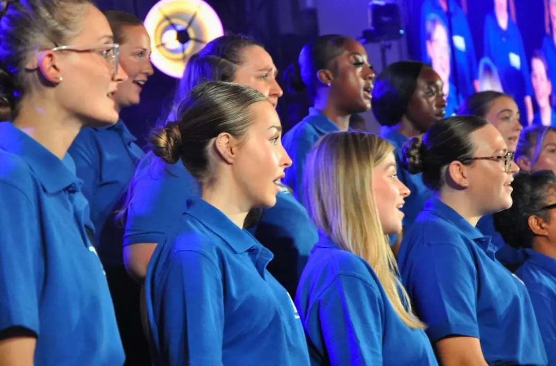 A photo shows singers at Territorial Music School 2026.