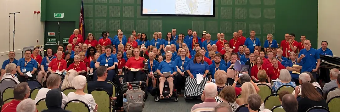 A group photo shows the delegates of the enabled Summer Extravaganza 2026.