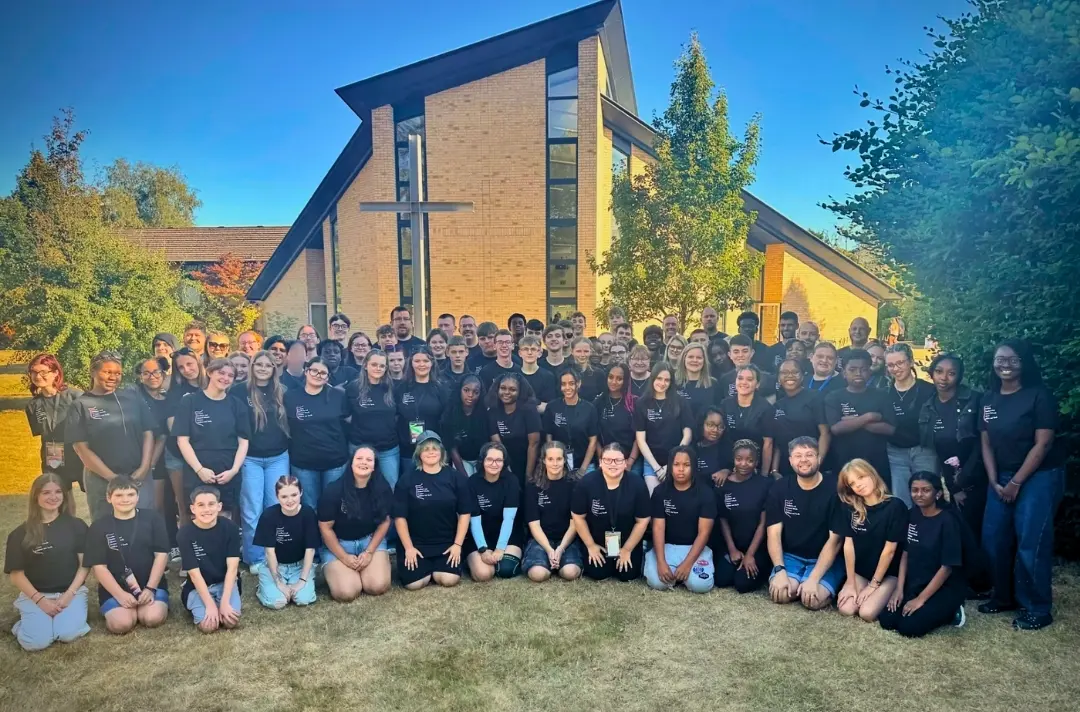 A photo shows the delegates of the Central, Southern and Channel Islands summer school.