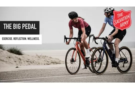 two women cycling 