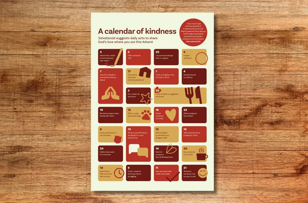 A graphic shows the Advent calendar of kindness against a wooden background.
