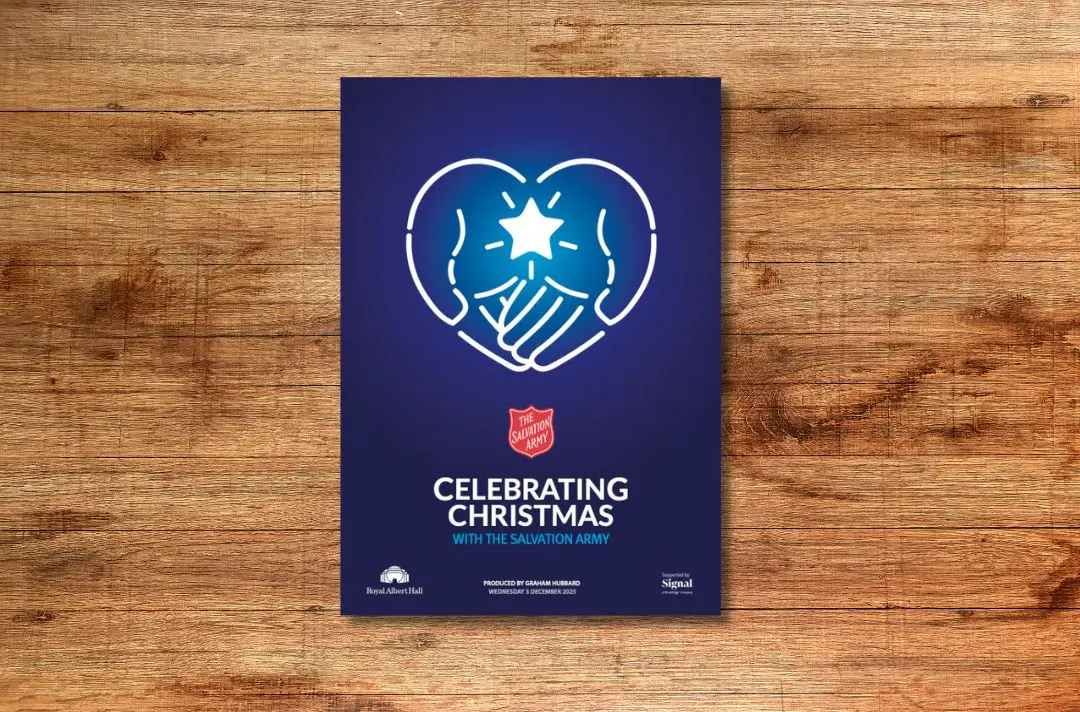 The front cover of the carol concert programme featuring a motif of hands making a heart shape with a star in the middle