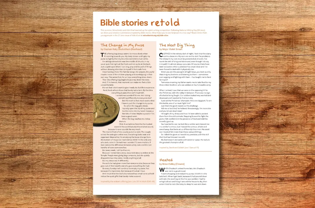 A photo shows a page of Bible stories against a wooden background.