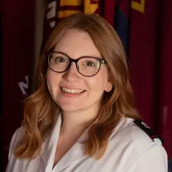 A photo shows Beth Hollidge.