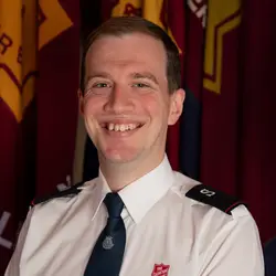 A photo shows Philip Henderson.