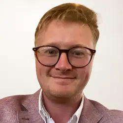 A photo shows Dan Bate.