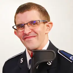 A photo shows Justin Gibson.