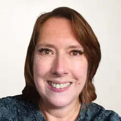 A photo shows Lyn Woods.