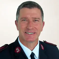A photo shows Phil Layton.
